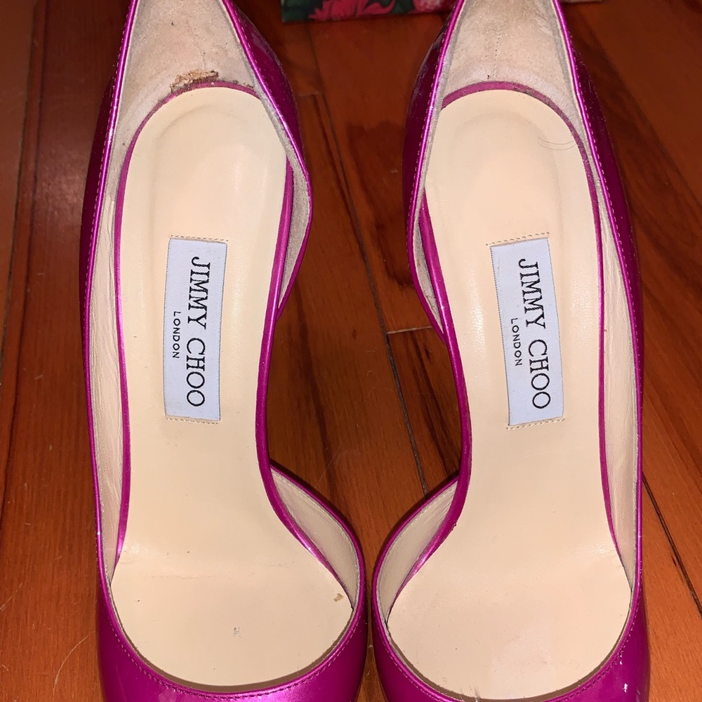 Jimmy Choo Heels .